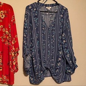 A beautiful blue blouse that ties in the front